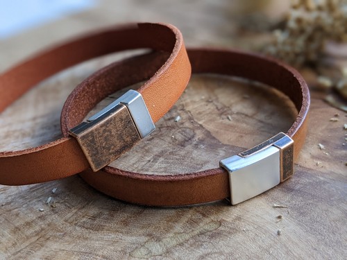 Due coppie bracciali - due,