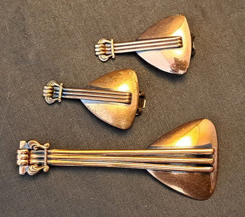 Set orecchini spilla strumento