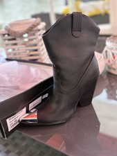 Texani bassi neri con punta