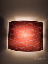 Lampadario da soffitto con luce molto calda che crea una bellissima atmosfera