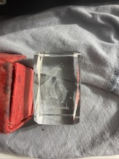 Rolex fermacarte in cristallo con incisione delfino