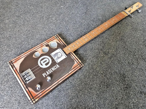 Cigar box guitar string - guitar,