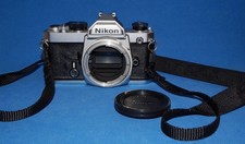 Nikon FM, testata, nuove guarnizioni, tappo, tracolla