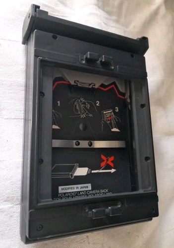 Polaroid dorso studio - dorso, e