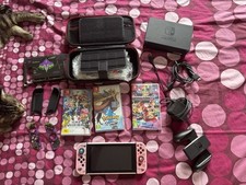 Nintendo Switch + 3 giochi (Mario Kart, Smash, Pokémon) + accessori