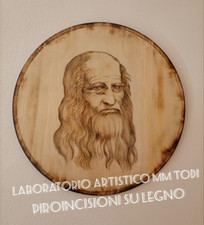 Quadro tondo "Leonardo da Vinci" pirografia su legno diametro cm 42