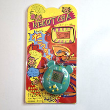 Nekotcha Virtual Pet Tamagotchi Style Green With Open Box Working/Tested