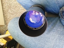 Olympus OM-System Zuiko MC f/4 con paraluce e Tappi