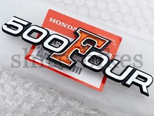 NUOVO ORIGINALE Honda coperchio laterale emblema in plastica per CB500 K0 K1 Four (87124-323-000)
