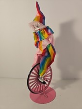 Clown su monociclo