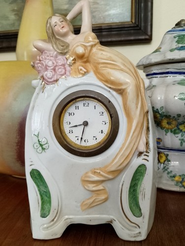 Antico orologio porcellana