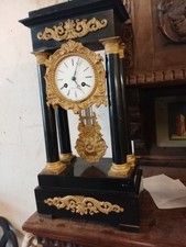 orologio antico a pendolo