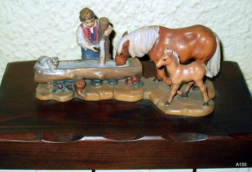 Scultura legno cavalli - in,