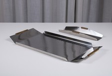 Coppia di vassoi in acciaio