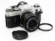✮ Canon AE-1 con obiettivo