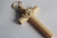 Antica croce culla celluloide