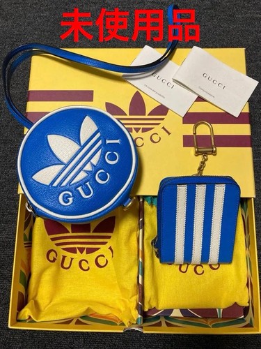Portafoglio gucci adidas - gucci,