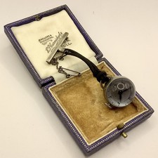 Spilla orologio scheletro