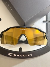 Occhiali da sole Oakley Radar EV Path lenti oro 24K montatura nero opaco spedizione veloce
