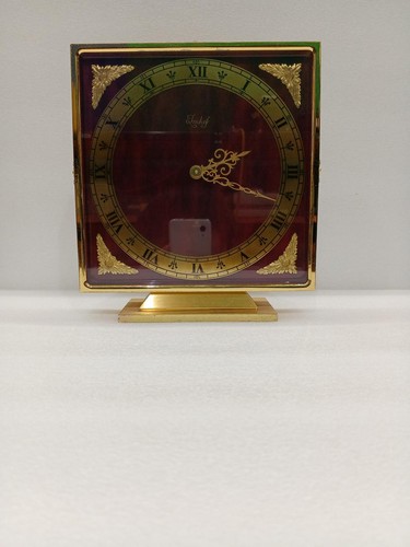 Orologio tavolo carica - da,