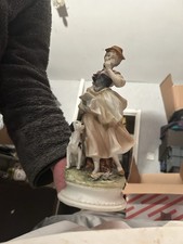 Unmarked Lady And Dog Figurine