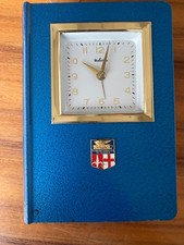 Salvadanaio libro con  sveglia Italora 