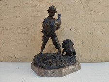 SCULTURA IN BRONZO BAMBINO CON