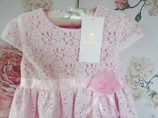 Abito da festa in pizzo rosa