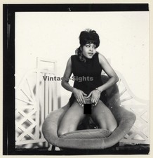 Semi Nude Dark-Skinned Female