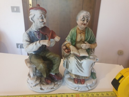 Coppia vecchi statuette - di,