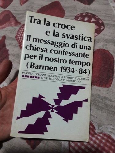 Tra croce svastica - e,