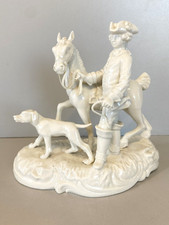 WHITE PORCELAIN FIGURINE