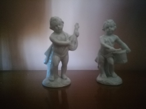 Coppia statuine putti - di,