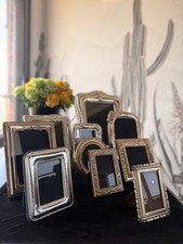 Set di 11 cornici in argento