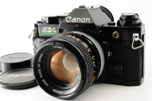 Canon program black con - black,