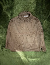 [L] Giacca in polietilene con