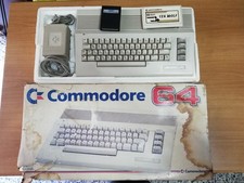 Commodore 64 II (C64C) box + alimentatore + cartucce giochi