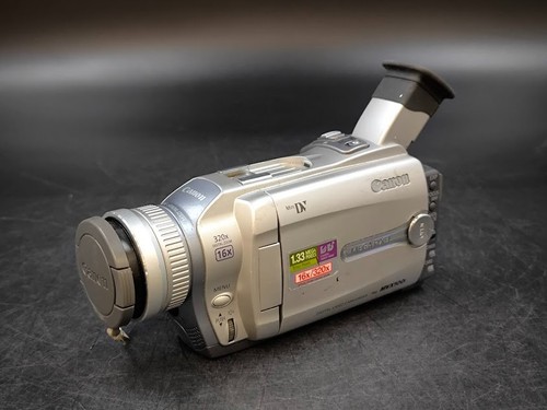 Canon mvx100i zoom - e,