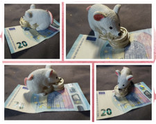 Geldmaus Symbol Glück