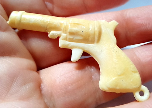 Pistola miniatura plastica - in,