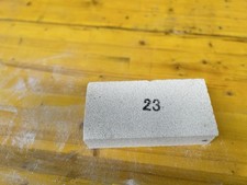 Mattone refrattario isolante