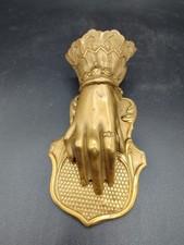 Mano fermacarte in ottone
