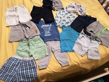 stock vestiti bambino 9-12 e