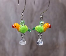 Orecchini pendenti teste di