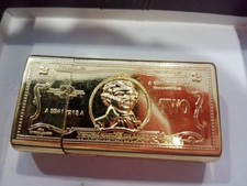 Accendino metallo dorato