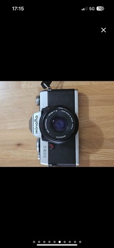 Minolta 100 x - 100,