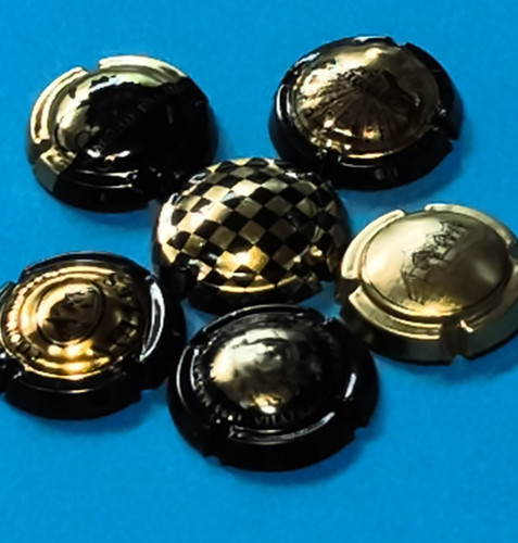 Capsule dorate nere varie - dorate,