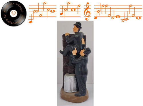 Laurel hardy climbing over a - &,