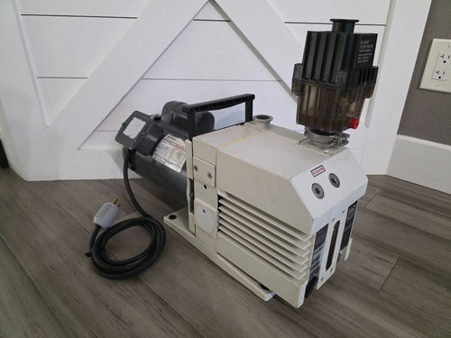 Pompa per vuoto rotativa - , a