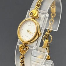 Raro orologio Seiko Alba bracciale strass design ovale testato funzionante